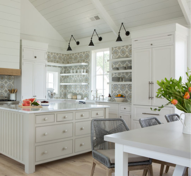 The kitchen island is this beautiful coastal cottage is painted Benjamin Moore Pashmina. COME FIND 3 Neutral Paint Color Ideas from Southeastern Designer Showhouse 2020! #PASHMINA #benjaminmoorepashmina #paintcolors