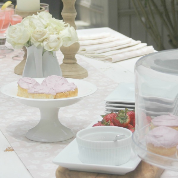 Romantic, simple, French courtyard with pink accents for a tea party - Hello Lovely Studio.