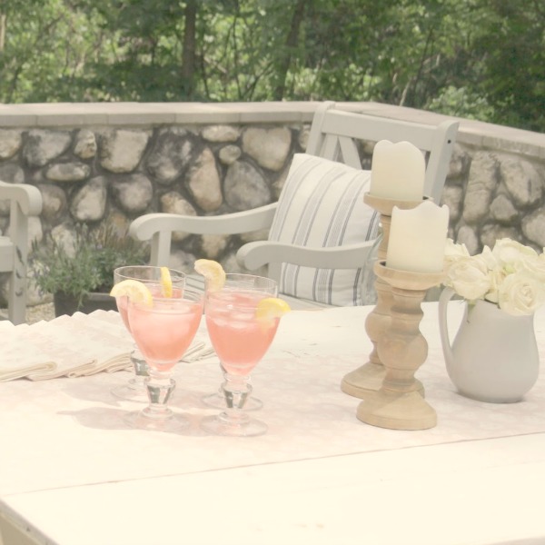 Romantic, simple, French courtyard with pink accents for a tea party - Hello Lovely Studio.