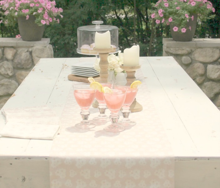Romantic, simple, French courtyard with pink accents for a tea party - Hello Lovely Studio.