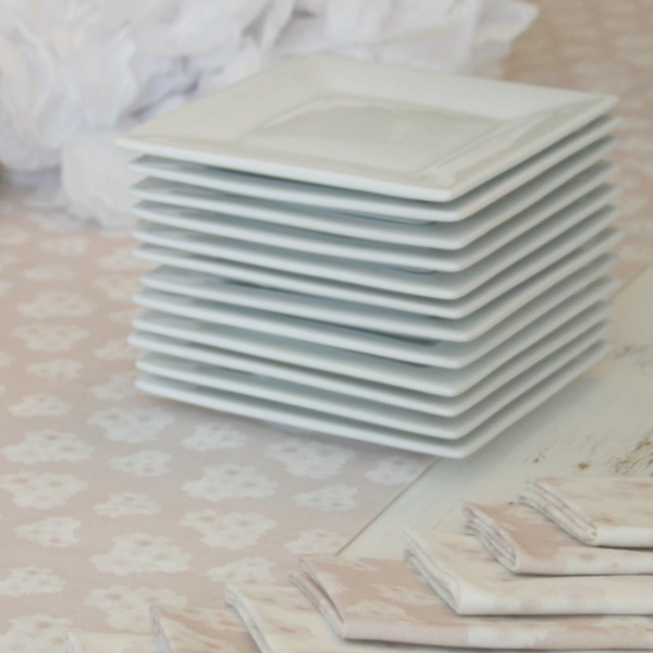 Romantic, simple, French courtyard with pink accents for a tea party - Hello Lovely Studio.