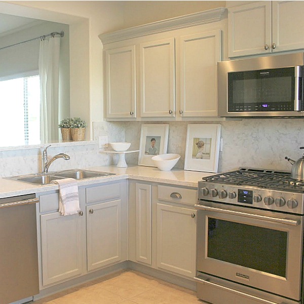 Serene Arizona kitchen with grey cabinets and Kitchenaid appliances. Hello Lovely Studio.