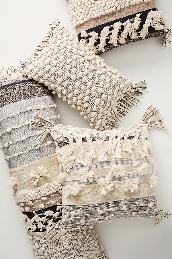 All Roads Yucca Pillows from Anthropologie - French Farmhouse Decor on Fixer Upper Get the Look The Club House Family Room with Shopping Resources as well as Design Ideas.