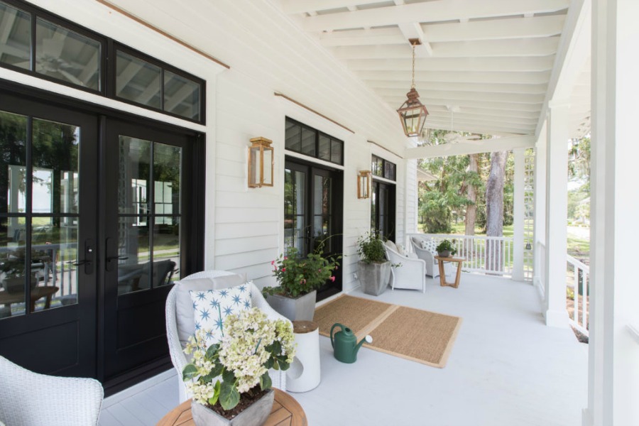 Covered front porch. Modern Coastal Cottage Design Inspiration in 2018 Coastal Living Idea House. Design by Jenny Keenan and architecture by Eric Moser.