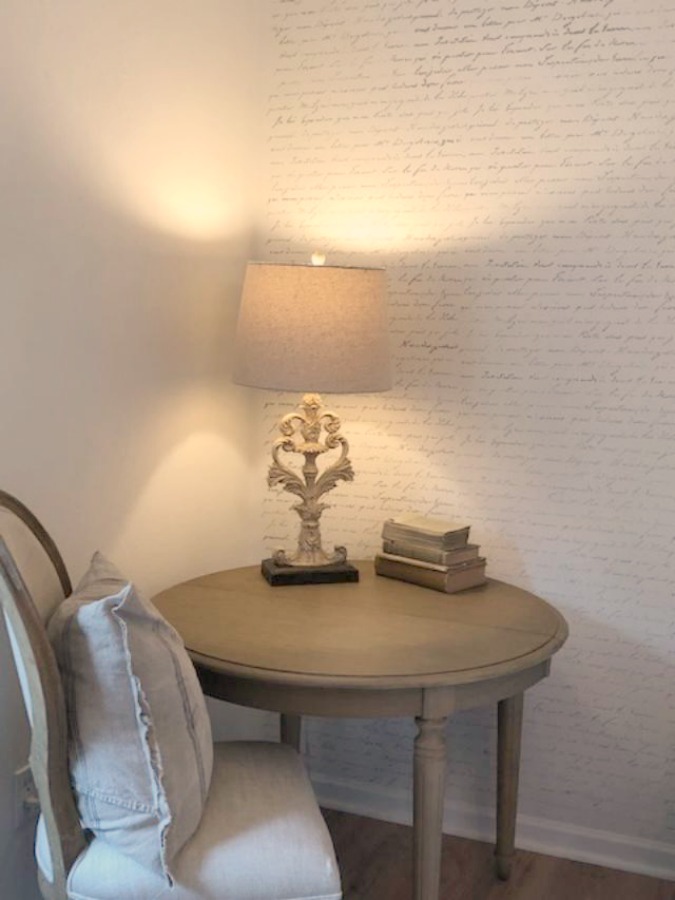 DIY Chic French Script Stenciled Accent Wall. Country French farmhouse style bedroom with French script stenciled wall by Hello Lovely Studio. #frenchcountry #frenchfarmhouse #frenchscript #diy #stenciledwall