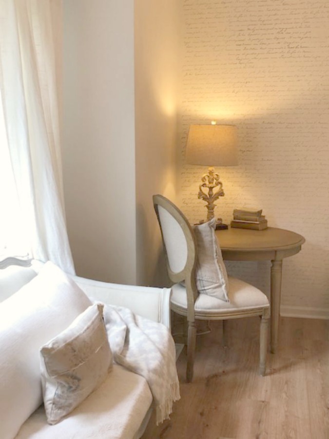DIY Chic French Script Stenciled Accent Wall. Country French farmhouse style bedroom with French script stenciled wall by Hello Lovely Studio. #frenchcountry #frenchfarmhouse #frenchscript #diy #stenciledwall