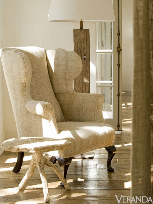 Rustic elegant French country style wingback chair and table - design by Pamela Pierce. Photo by Peter Vitale for Veranda.