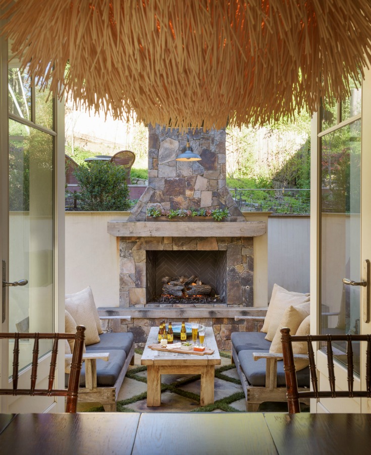 Beautiful patio inspiration with fireplace and design by Alison Pickart.