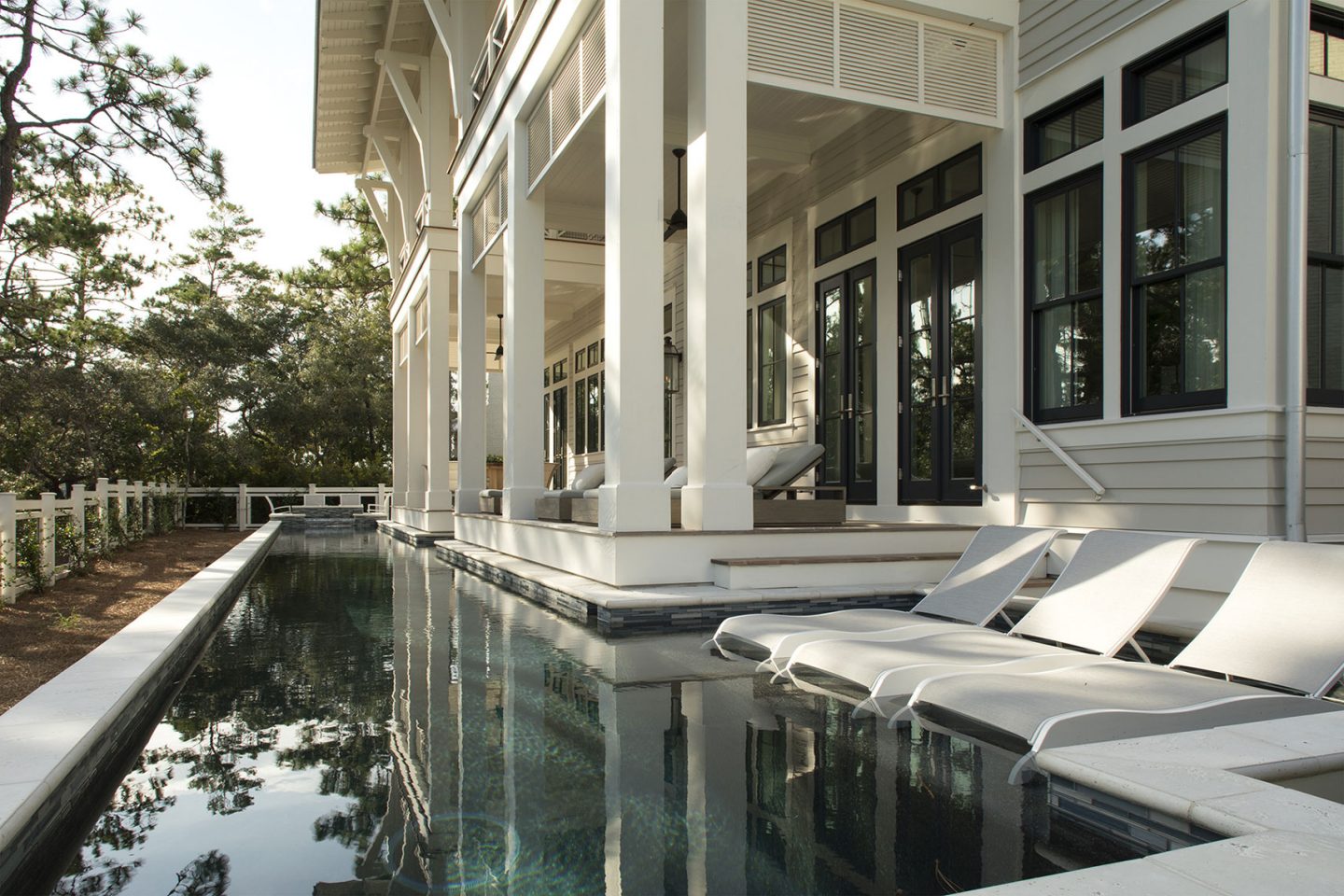 Luxurious pool design inspiration from a magnificent coastal style classic home by architect Geoff Chick. #luxurypool #pooldesign #coastalstyle