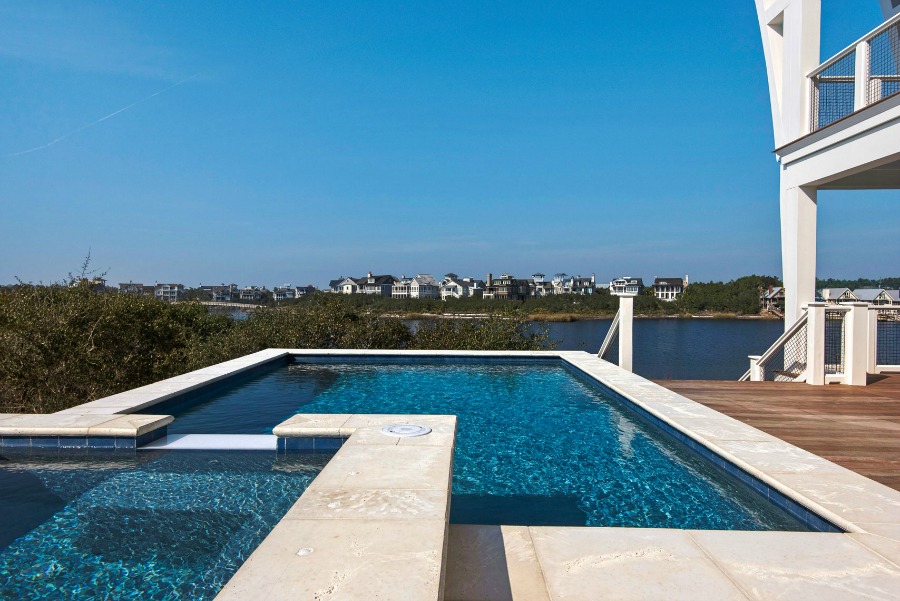 Luxurious pool design inspiration from a magnificent coastal style classic home by architect Geoff Chick.