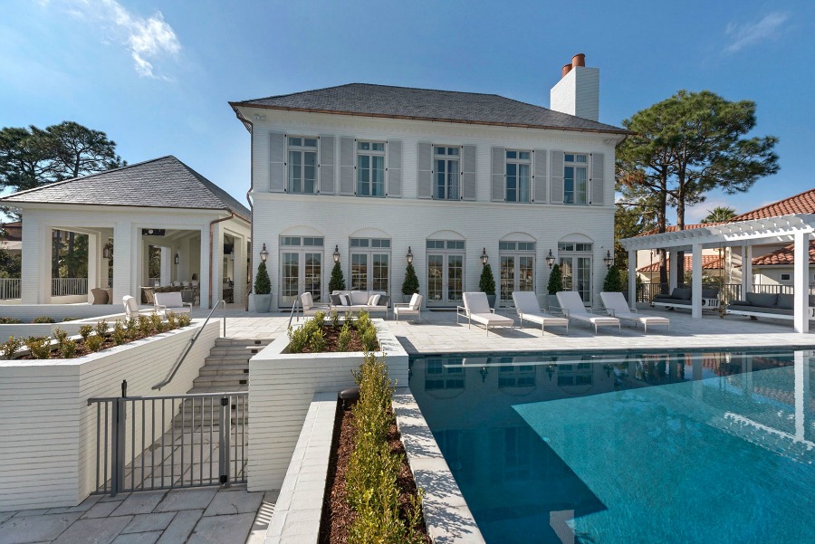 Luxurious pool design inspiration from a magnificent coastal style classic home by architect Geoff Chick. #pooldesign #luxurypool #coastalstyle