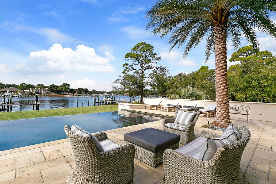 Luxurious pool design inspiration from a magnificent coastal style classic home by architect Geoff Chick. #pooldesign #luxurypool #coastalstyle #beachhouse