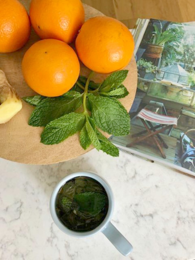 Ingredients for fresh mint tea in my white kitchen - Hello Lovely Studio.