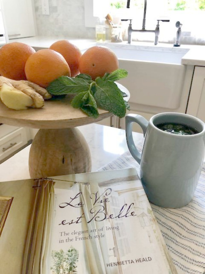 Ingredients for fresh mint tea in my white kitchen - Hello Lovely Studio.