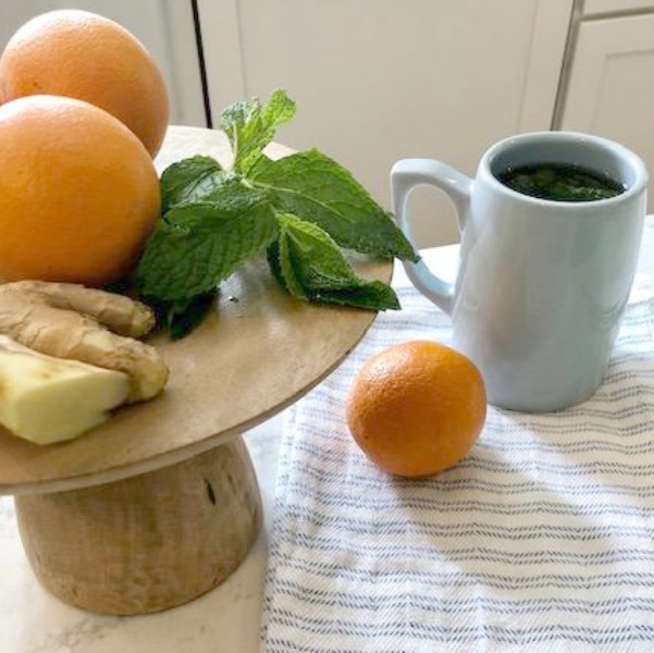 Ingredients for fresh mint tea in my white kitchen - Hello Lovely Studio.