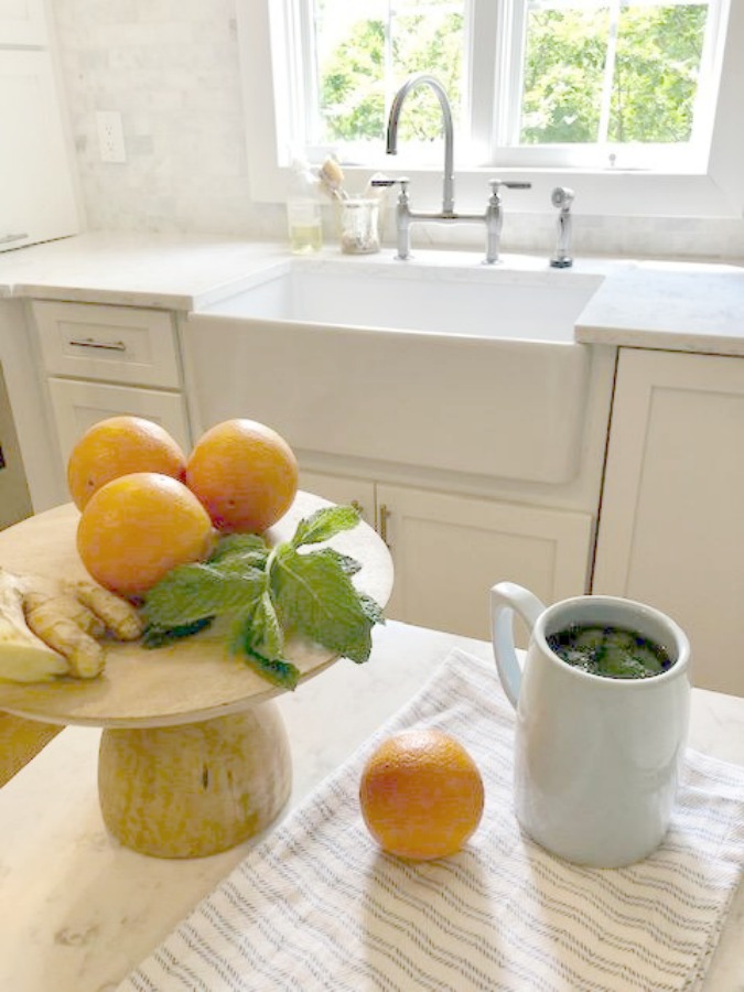 Ingredients for fresh mint tea in my white kitchen - Hello Lovely Studio.