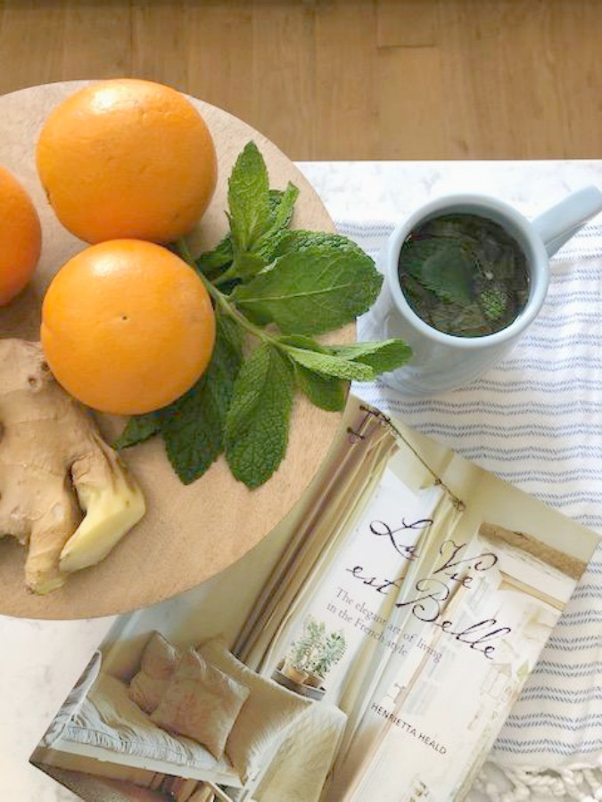 Ingredients for fresh mint tea in my white kitchen - Hello Lovely Studio. Charming European Country Interior Design Inspiration: June Favorites, Part 2 Shares French Country Photos of Interiors to Inspire As Well As Decorating Finds and Tips Shared in June.