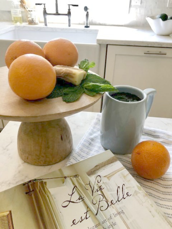 Ingredients for fresh mint tea in my white kitchen - Hello Lovely Studio.