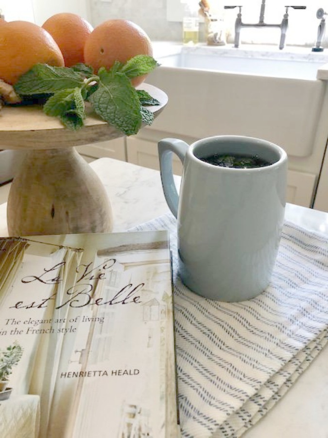 Ingredients for fresh mint tea in my white kitchen - Hello Lovely Studio.