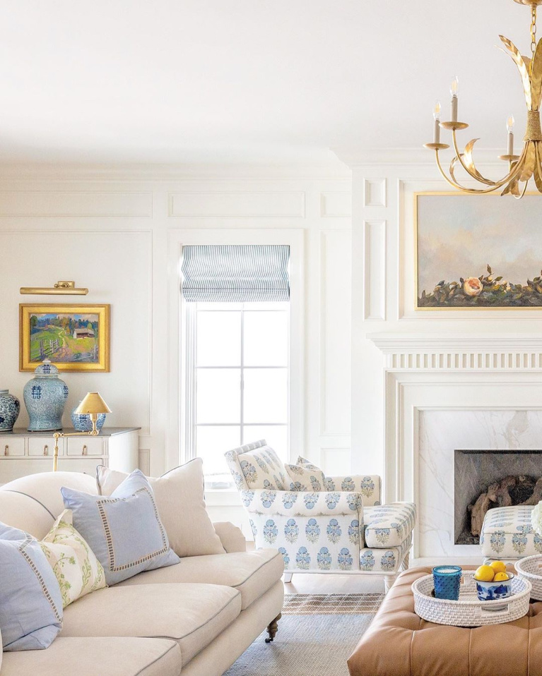 Gorgeous blue and white family room with pale tones and magnificent architecture by The Fox Group. #thefoxgroup #familyroom #interiordesign #blueandwhite #traditionalstyle #classicdesign