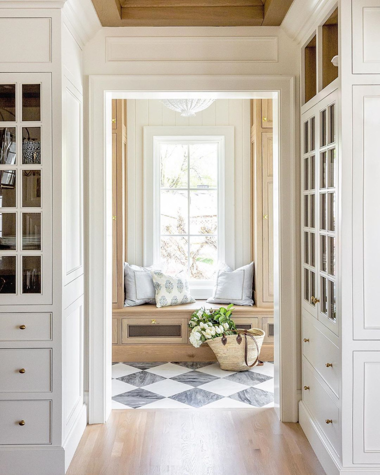 Breathtaking mud room and kitchen in a traditional style home by The Fox Group. #thefoxgroup #mudroom #modernfarmhouse #traditionalstyle #classicdesign #eleganthomes #interiordesign