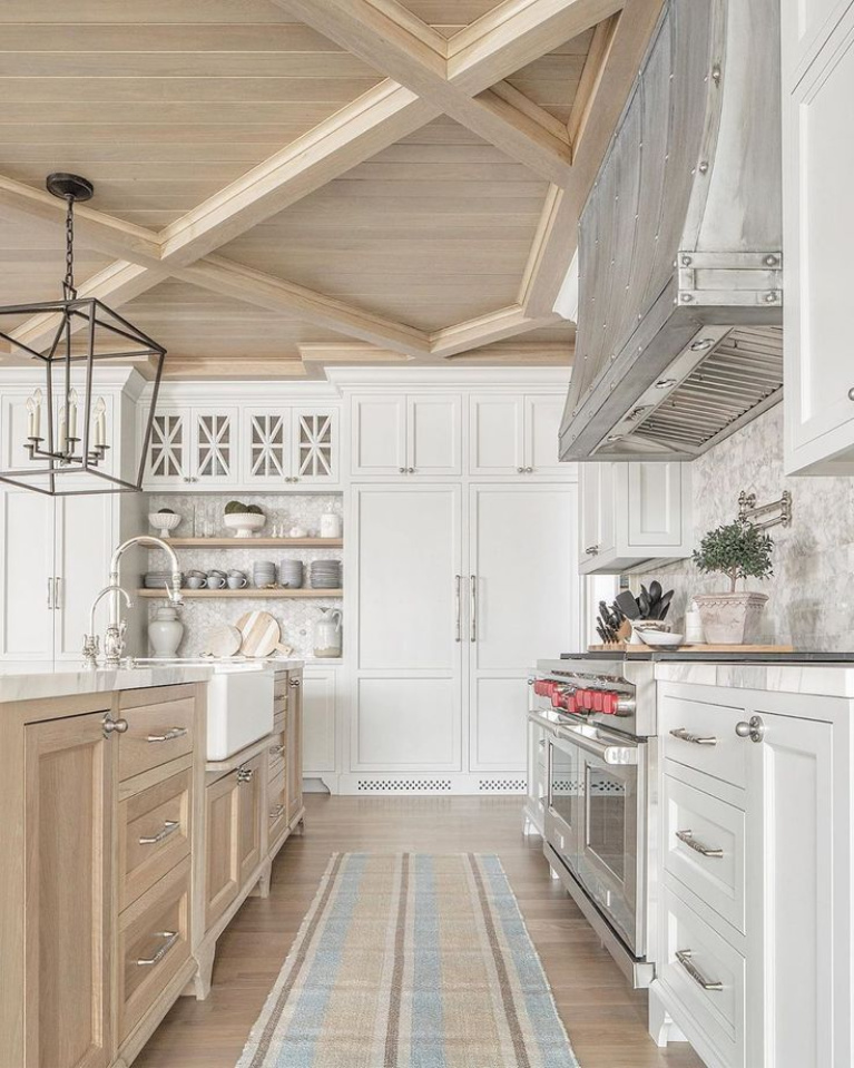 Modern farmhouse white kitchen with beautiful wood ceiling detail and breathtaking architectural design - The Fox Group. #modernfarmhouse #thefoxgroup #kitchendesign #woodceiling #traditionalkitchens #twotonekitchen #zinchood #whitekitchens