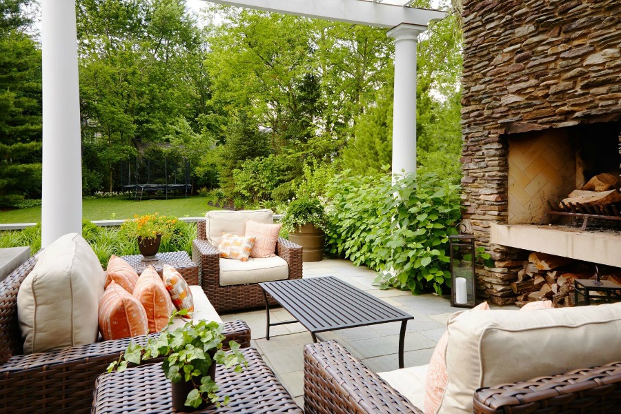 Magnificent pergola with outdoor living area and design by Tom Stringer on Hello Lovely Studio.