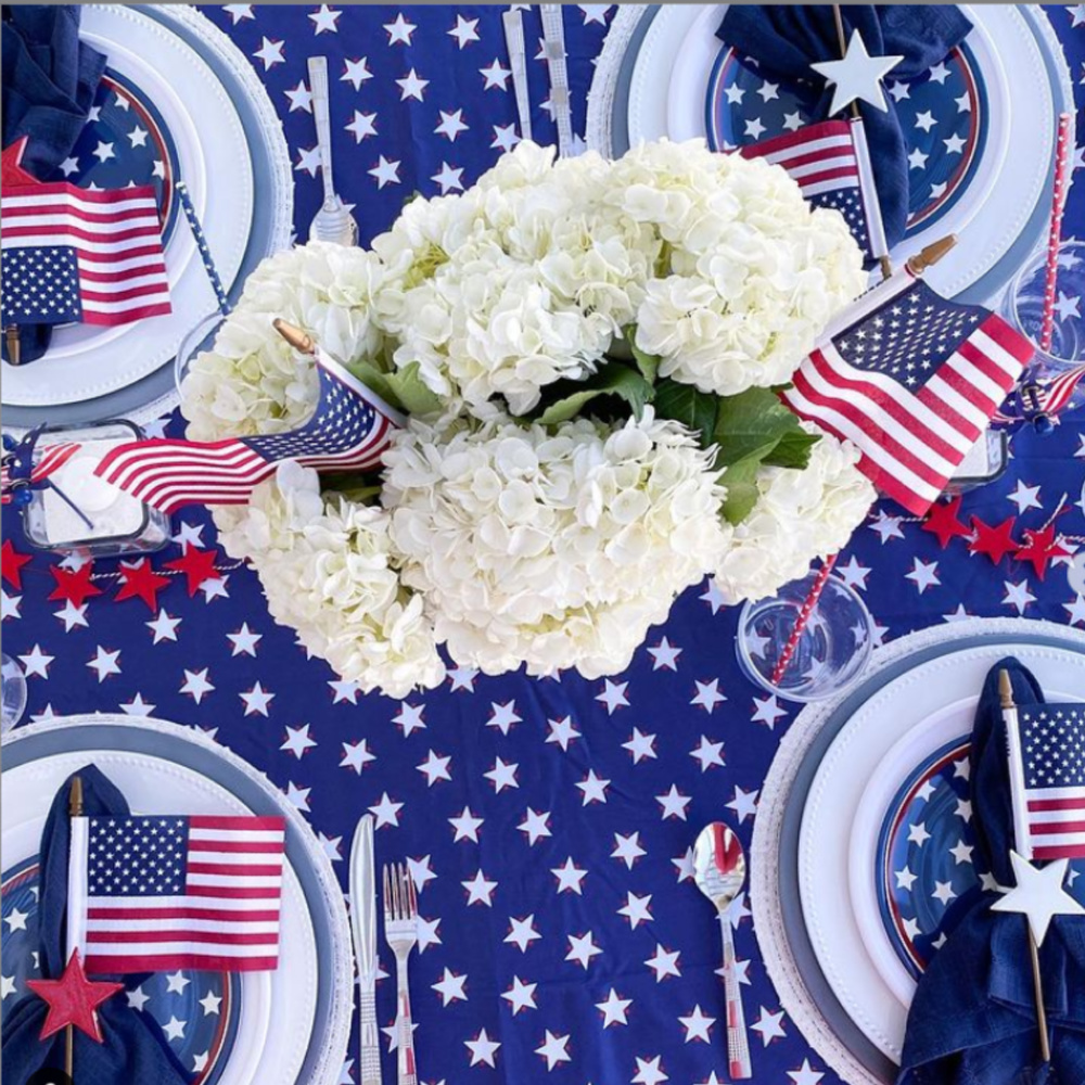 Festive and patriotic American tablescape with flags, stars, hydrangea and 4th of July style - @arayofbliss