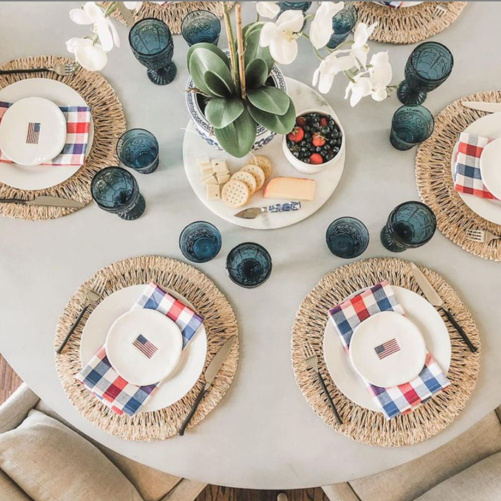 Gorgeous tablescape for July 4th with American flag plates from Williams-Sonoma - @jchildressinteriors. #tablescapes #4thofjuly #independenceday #july4 #americanflag