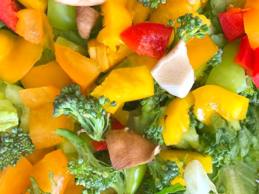 Fresh colorful summer vegetable salad - Hello Lovely Studio.