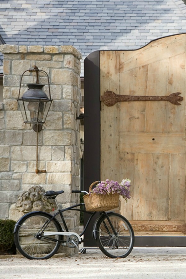 Exquisite French country chateau gates and vintage bicycle with basket - Chateau Domingue. Come explore French Country Basket Inspiration: Resources for Rustic, French Market, and Boulangerie as well as photos to Inspire!