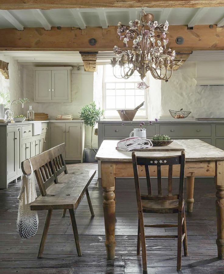 Beautifully rustic English country kitchen in the UK by deVOL has Shaker style cabinetry, farm sink, and a serene palette. #european country #englishcountry #countrykitchen #kitchendesign #rustickitchen #frenchkitchen #shakerkitchen