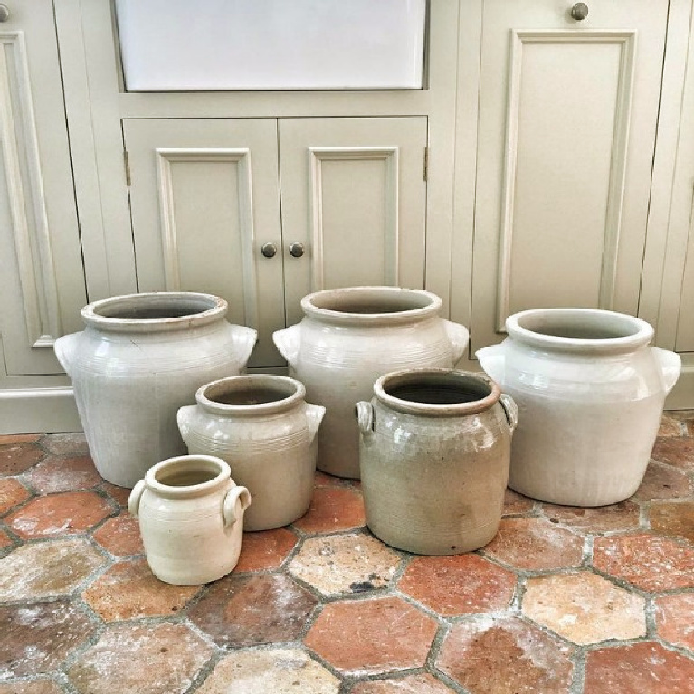 French farmhouse kitchen with reclaimed antique terracotta tile flooring and decor by Vivi et Margot. #frenchfarmhouse #kitchen #frenchkitchen #countryfrench #housesinfrance