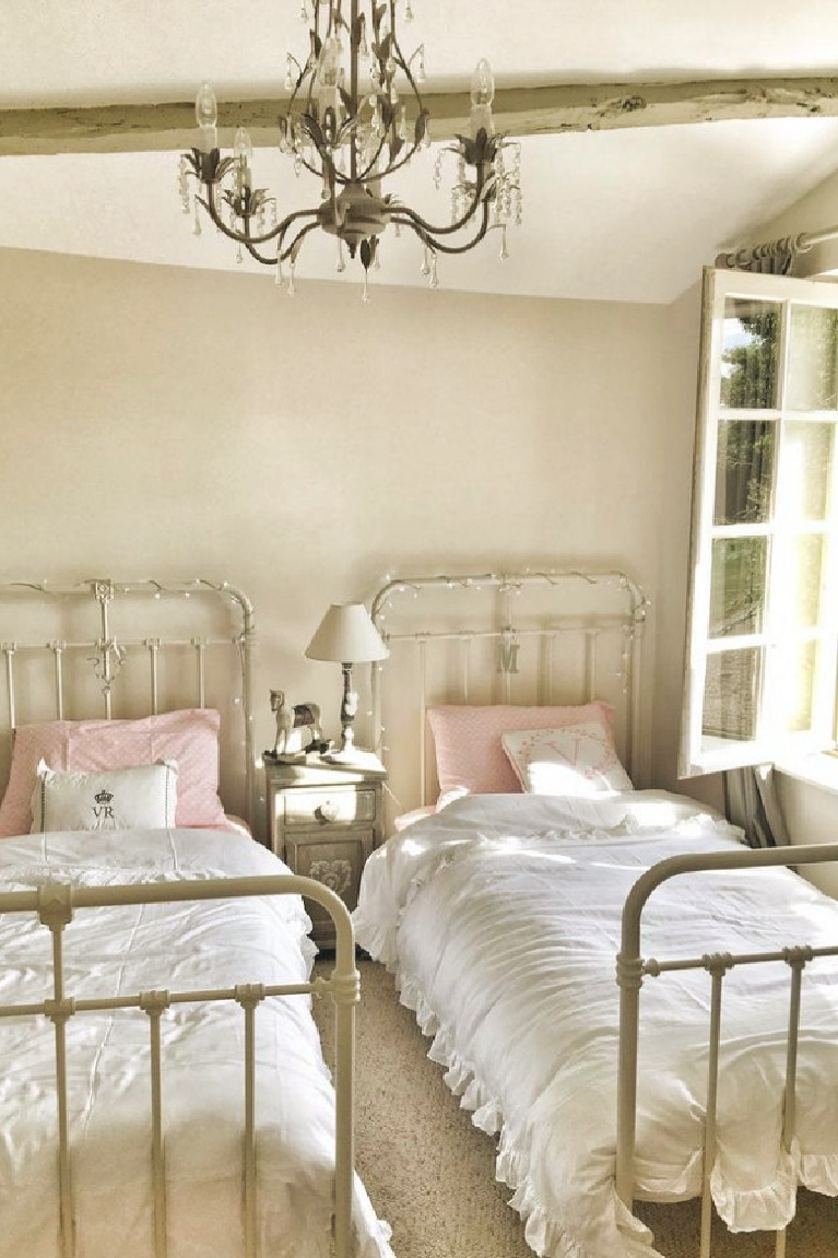 Strong White (Farrow & Ball) walls in French country girls bedroom in a farmhouse in France by Vivi et Margot. #strongwhite #whitepaintcolors
