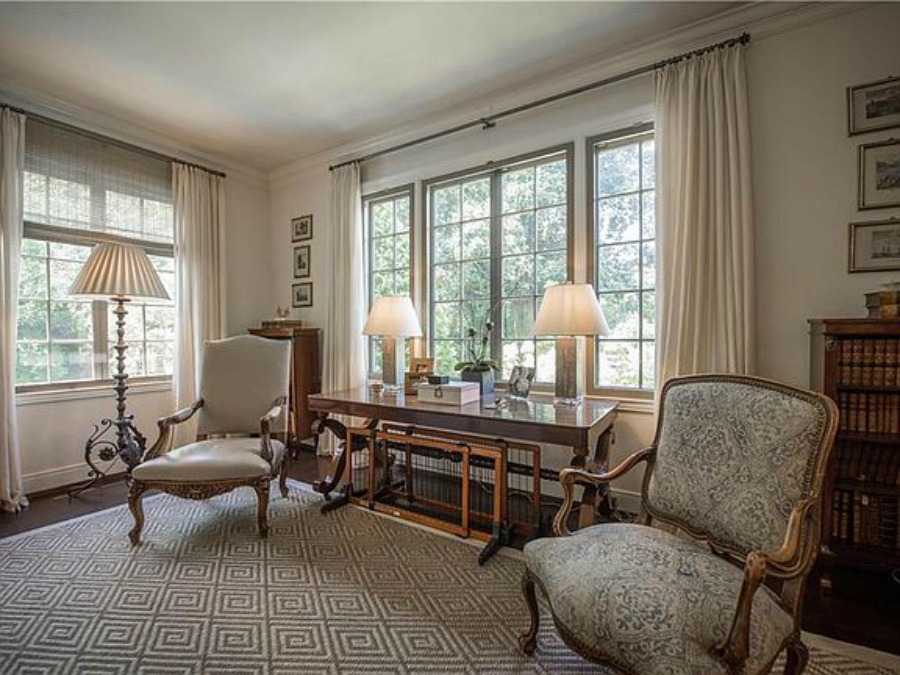 Elegant historic home with Old World style and beautifully classic European inspired interiors in Marietta Georgia was built for the Kennedy-DuPre family. ee more of the Entry, Living Room & Kitchen Design Inspiration As Well As Photos of a Beautiful Georgia Tudor Exterior on Hello Lovely Studio.