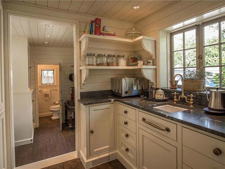 Butler pantry in an elegant historic home with Old World style and beautifully classic European inspired interiors in Marietta Georgia was built for the Kennedy-DuPre family. See more in Traditional Style House Tour: 1935 English Tudor on Hello Lovely Studio.