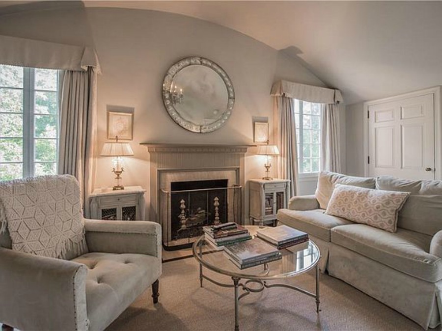 Sitting area with fireplace in bedroom of an elegant historic home with Old World style and beautifully classic European inspired interiors in Marietta Georgia was built for the Kennedy-DuPre family. . See more  English Tudor Interior Design Inspiration from this European Country Master Suite & Dining Room Design Inspiration on Hello Lovely Studio.