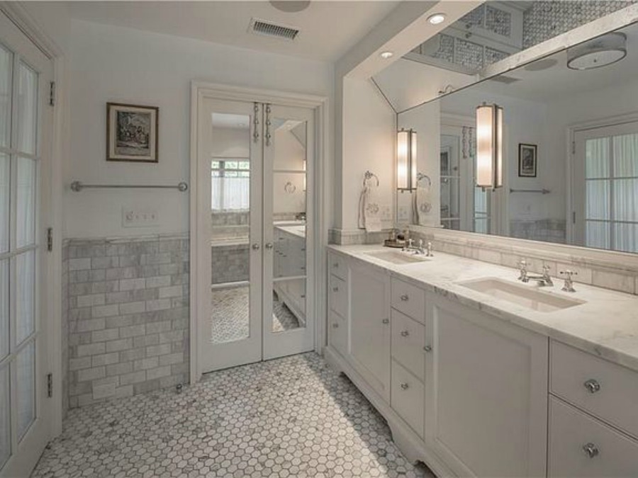 Luxurious marble bathroom in an elegant historic home with Old World style and beautifully classic European inspired interiors in Marietta Georgia was built for the Kennedy-DuPre family. . See more  English Tudor Interior Design Inspiration from this European Country Master Suite & Dining Room Design Inspiration on Hello Lovely Studio.