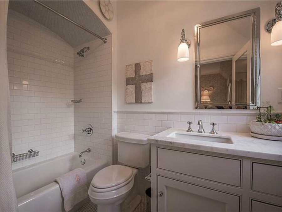 Bathroom in an elegant historic home with Old World style and beautifully classic European inspired interiors in Marietta Georgia was built for the Kennedy-DuPre family. See more in Traditional Style House Tour: 1935 English Tudor on Hello Lovely Studio.