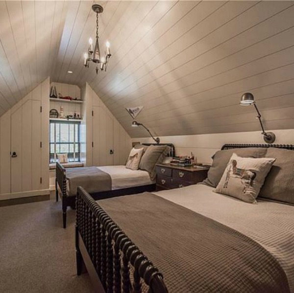 Attic bedroom in an elegant historic home with Old World style and beautifully classic European inspired interiors in Marietta Georgia was built for the Kennedy-DuPre family. See more in Traditional Style House Tour: 1935 English Tudor on Hello Lovely Studio.