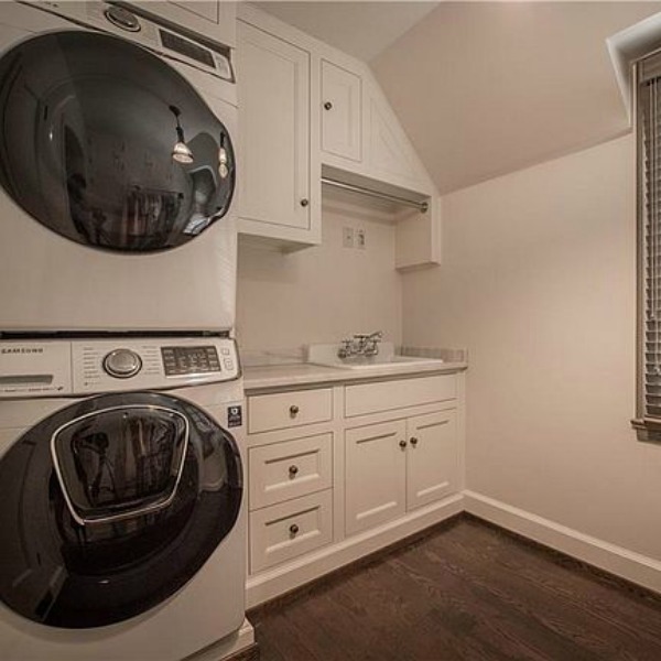 Laundry room in an elegant historic home with Old World style and beautifully classic European inspired interiors in Marietta Georgia was built for the Kennedy-DuPre family. See more in Traditional Style House Tour: 1935 English Tudor on Hello Lovely Studio.