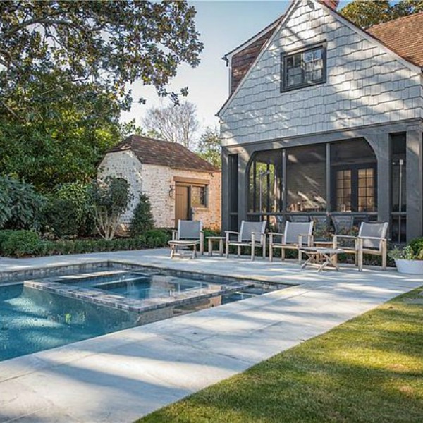 Pool and backyard at an elegant historic home with Old World style and beautifully classic European inspired interiors in Marietta Georgia was built for the Kennedy-DuPre family. See more in Traditional Style House Tour: 1935 English Tudor on Hello Lovely Studio.