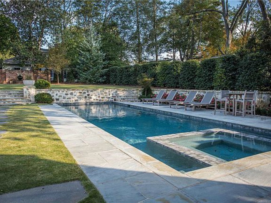 Pool at an elegant historic home with Old World style and beautifully classic European inspired interiors in Marietta Georgia was built for the Kennedy-DuPre family. See more in Traditional Style House Tour: 1935 English Tudor on Hello Lovely Studio.