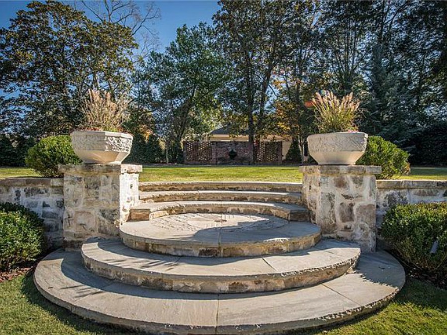 Stone steps at an elegant historic home with Old World style and beautifully classic European inspired interiors in Marietta Georgia was built for the Kennedy-DuPre family. See more in Traditional Style House Tour: 1935 English Tudor on Hello Lovely Studio.