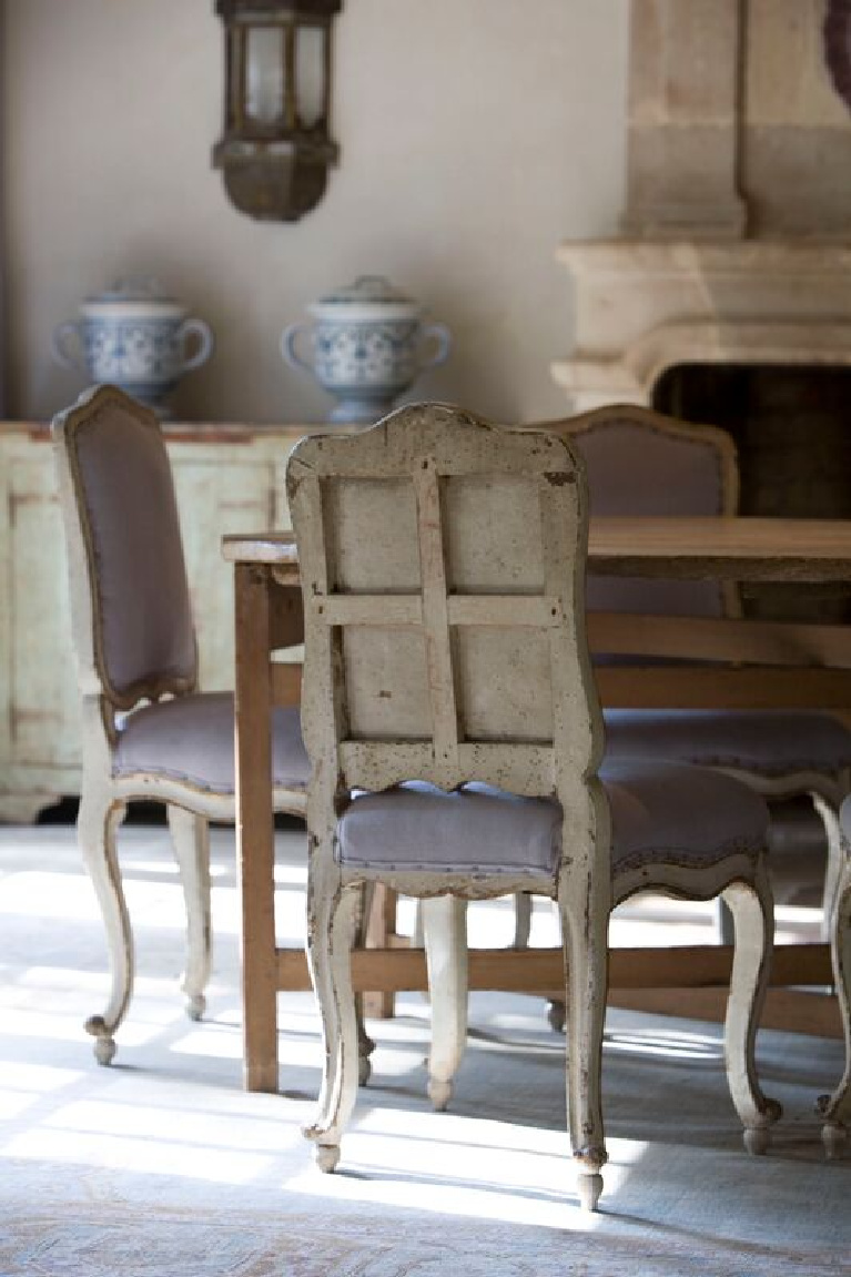 Dining room. Chateau Domingue antiques and reclaimed stone in a breathtaking Houston home with interior design by Pamela Pierce. #chateaudomingue #frenchfarmhouse #interiordesign #oldworld #pamelapierce #reclaimedstone
