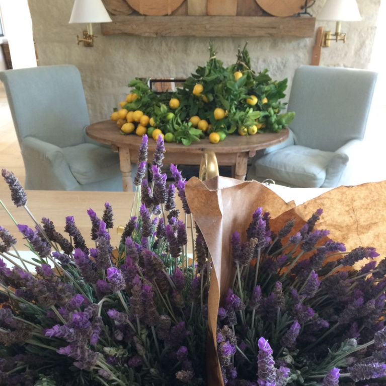 Brooke Giannetti designed Patina Farm European country French farmhouse kitchen with lavender and lemons near the hearth. #patinafarm #giannetti #frenchfarmhouse #interiordesign #kitchen #europeancountry