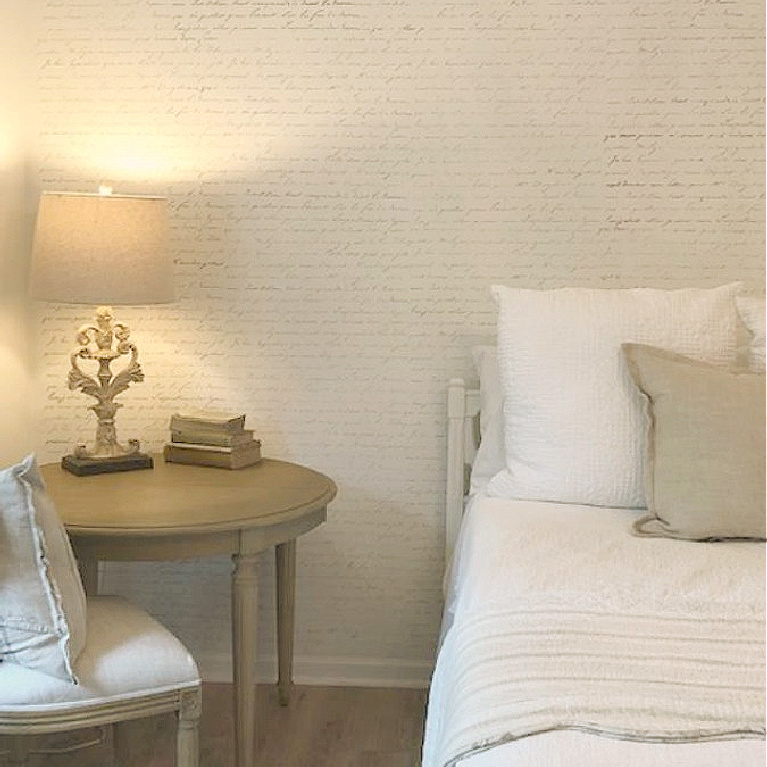DIY French Script Stenciled Wall - Hello Lovely Studio. #stencils #frenchscript #accentwall #statementwall #diy #homedecor #bedroomdecor