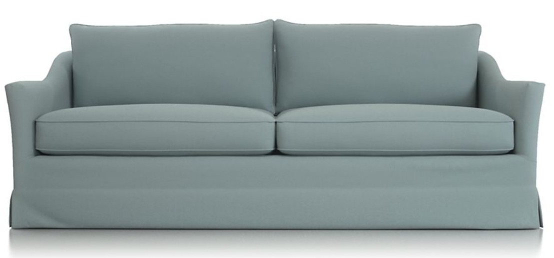 Keely sofa from Crate and Barrel ln a beautiful blue upholstery.