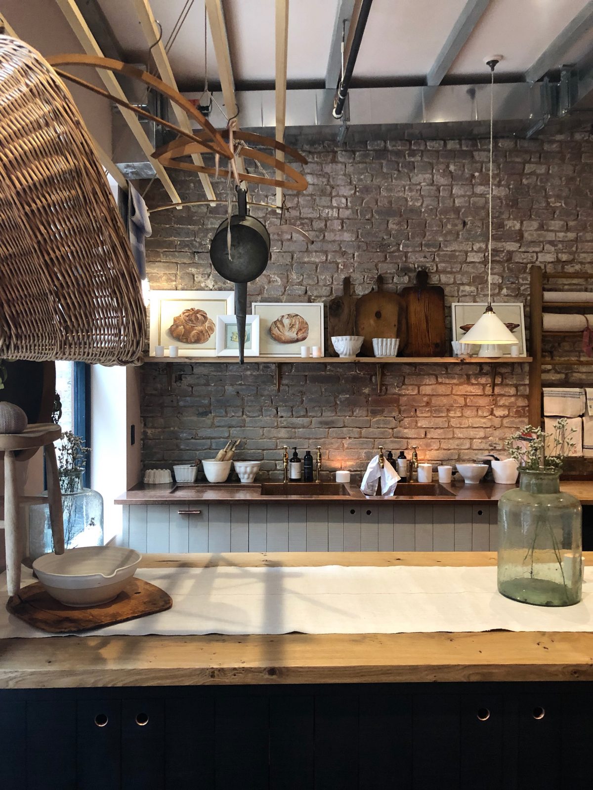 Beautifully rustic European country style kitchen design details in deVOL's Bond Street New York showroom. #rustickitchen #devol #europeancountry #kitchendesign #bespokekitchen