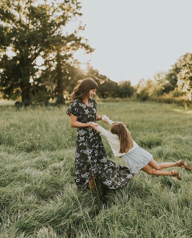 New Orleans artist Rebekah May at play with her daughter. Photo by